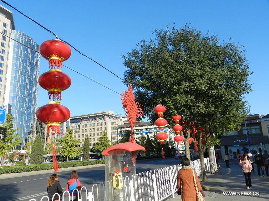Red lanterns are seen on the street to greet the upcoming 18th National Congress of the Communist Party of China (CPC) in Beijing, capital of China, Oct. 30, 2012. The CPC&apos;s 18th National Congress will be convened on Nov. 8, with more than 2,000 CPC delegates gathering for the meeting, which occurs every five years. A new CPC leadership will be elected during the meeting, setting a new direction for the country&apos;s development in the near future.