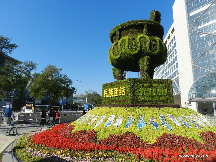 Flower decorations are seen on the street to greet the upcoming 18th National Congress of the Communist Party of China (CPC) in Beijing, capital of China, Oct. 30, 2012. The CPC&apos;s 18th National Congress will be convened on Nov. 8, with more than 2,000 CPC delegates gathering for the meeting, which occurs every five years. A new CPC leadership will be elected during the meeting, setting a new direction for the country&apos;s development in the near future.