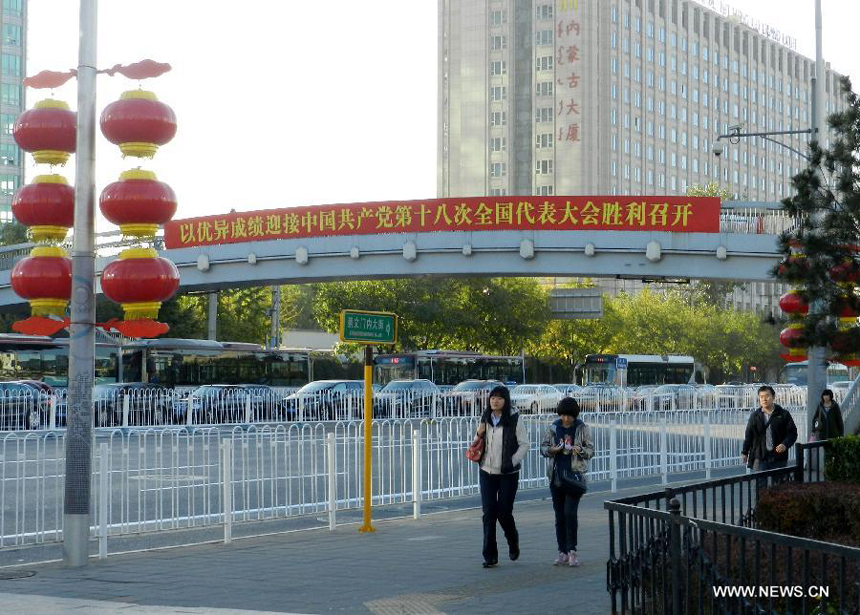 Red lanterns and banners are seen on the street to greet the upcoming 18th National Congress of the Communist Party of China (CPC) in Beijing, capital of China, Oct. 30, 2012. The CPC&apos;s 18th National Congress will be convened on Nov. 8, with more than 2,000 CPC delegates gathering for the meeting, which occurs every five years. A new CPC leadership will be elected during the meeting, setting a new direction for the country&apos;s development in the near future. 