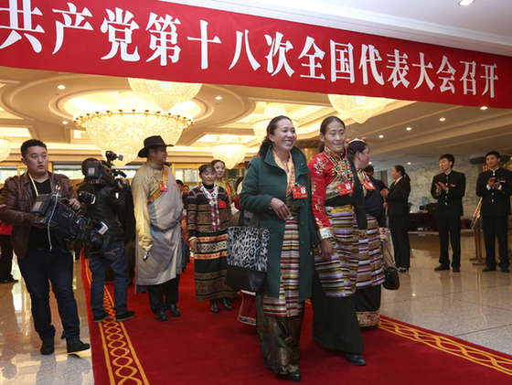 Delegates of the 18th National Congress of the Communist Party of China (CPC) from Tibet Autonomous Region arrive in Beijing, capital of China, on Nov. 5, 2012. The 18th CPC National Congress will be opened in Beijing on Nov. 8. 