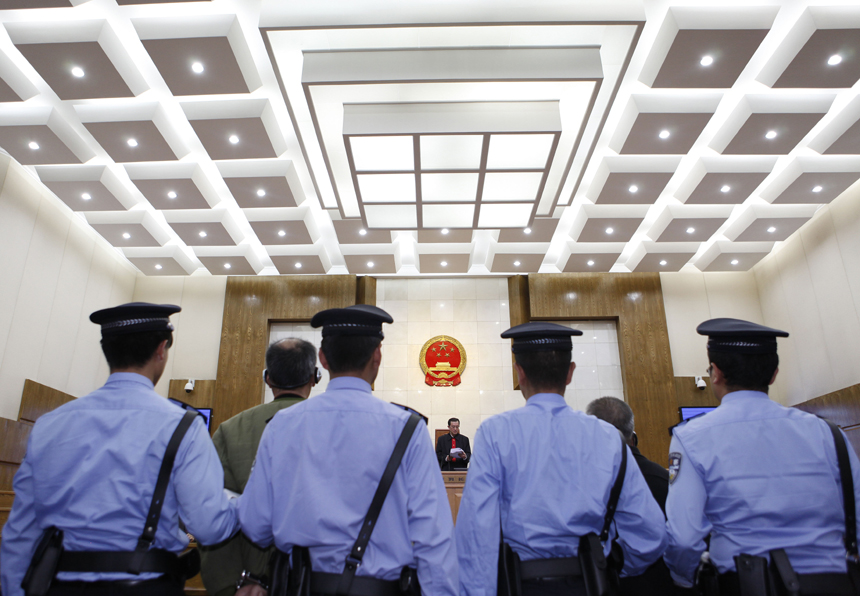Naw Kham, principal suspect accused in the Mekong River murder case, and five accomplices hear their verdicts at court in Kunming, capital of southwest China&apos;s Yunnan Province, Nov. 6, 2012. Naw Kham was sentenced to death on Nov. 6. The 13 Chinese sailors were murdered after two cargo ships, the Hua Ping and Yu Xing 8, were hijacked on Oct. 5, 2011 on the Mekong River, an important waterway in Southeast Asia. [Xinhua photo] 