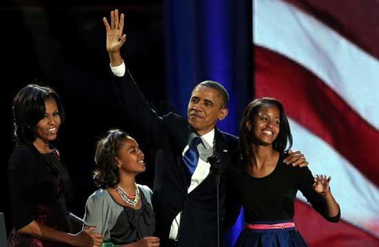 U.S. President Barack Obama walks on stage with first lady Michelle Obama and daughters Sasha and Malia to deliver his victory speech on election night at McCormick Place November 6, 2012 in Chicago, Illinois.