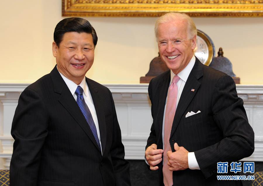 China's Vice-President Xi Jinping (L) meets with U.S. Vice President Joe Biden at the White House in Washington, February 14, 2012. [Xinhua] 