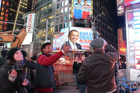 Obama supporters are celebrating cheerfully in Times Square, New York as Barack Obama has been re-elected. [China Daily]