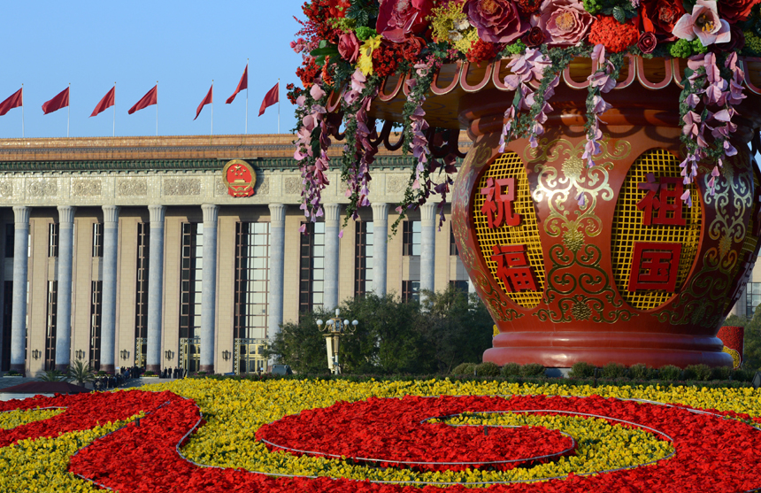 Flower decorations are seen on the street to greet the upcoming 18th National Congress of the Communist Party of China (CPC) in Beijing, capital of China,Nov. 8, 2012. The CPC's 18th National Congress convenes on Nov. 8, with more than 2,000 CPC delegates gathering for the meeting, which occurs every five years. A new CPC leadership will be elected during the meeting, setting a new direction for the country's development in the near future.