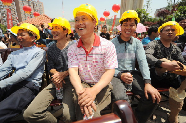Interest of migrant workers in China better guaranteed.[File photo]