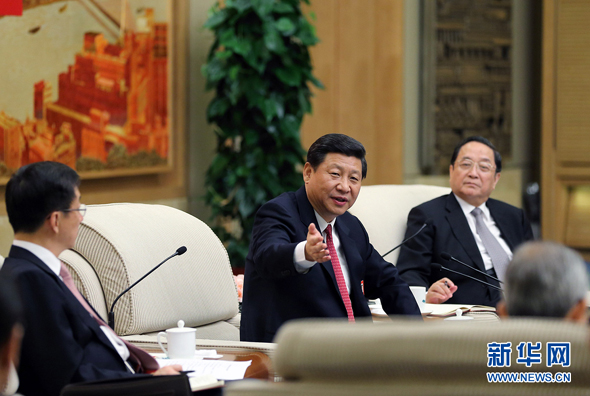  Xi Jinping speaks in a panel discussion of delegates to the Party congress from Shanghai on Nov. 8, 2012. 
