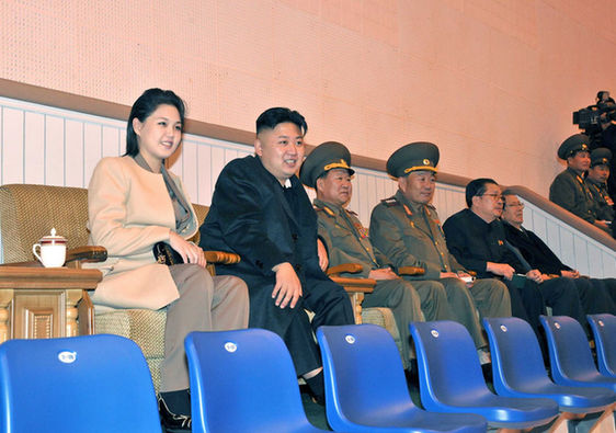 Kim Jong Un, top leader of the Democratic People's Republic of Korea (DPRK) and his wife Ri Sol Ju watch a women's volleyball match between the Pongae team and the Pyongyang team, according to the country's official news agency KCNA's report on Nov.7, 2012. [KCNA] 