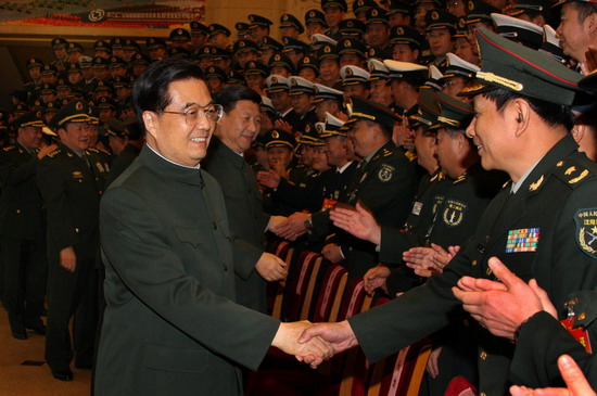 Chinese President Hu Jintao (L, front), also general secretary of the Communist Party of China (CPC) Central Committee and chairman of the Central Military Commission (CMC), meets with military representatives at a working conference on improving the combatment and safeguard ability of armament systems in Beijing, capital of China, Nov. 2, 2010. [Photo/Xinhua]