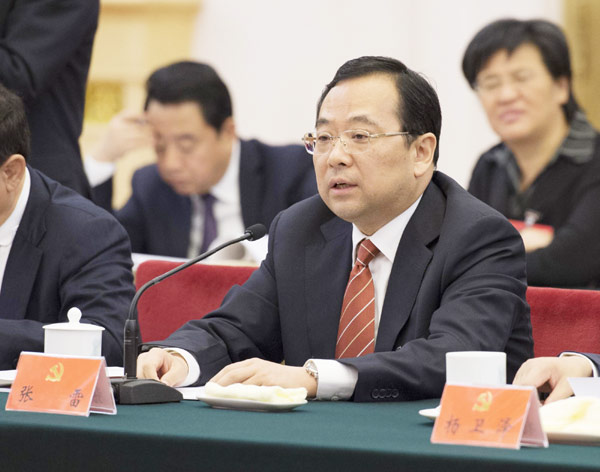 Zhang Lei, a delegate from Jiangsu province, said the Scientific Outlook on Development should be taken as a guide to improve industrial reconstruction and to build eco-friendly cities. He made his comments during a panel discussion at the 18th CPC National Congress in Beijing.[Photo/Xinhua]