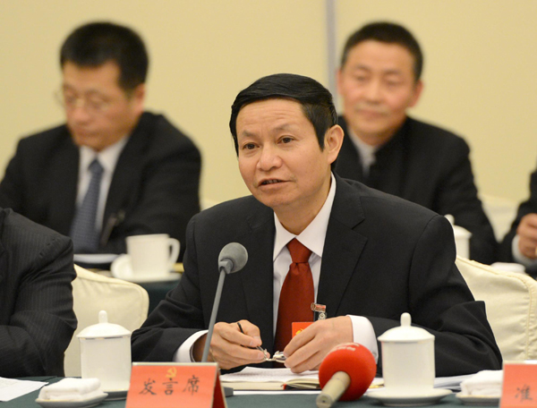 Wen Jianming, CPC delegate and secretary of the Party Committee in Chengnan Township, Sichuan Province, speaks at the 18th National Congress meeting in Beijing, Nov 12. [Photo/Xinhua]