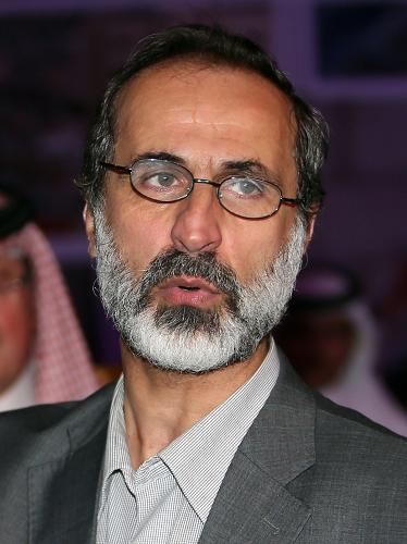 Cleric Ahmed Moaz al- Khatib, poses for a photo after he was is elected to lead the National Coalition on November 11, 2012. [Xinhua/AFP]