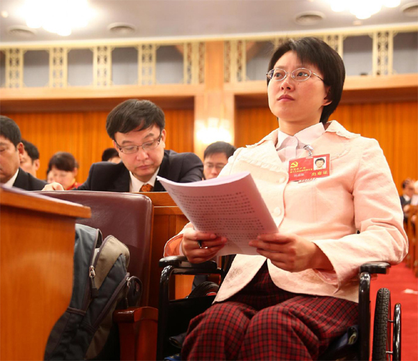 Hou Jingjing was one of China's Ten Most Outstanding Women in 2006, assistant professor at Nanjing Normal University and now a two-time delegate to the National Congress of CPC.