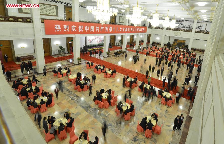 Delegates wait to attend the closing session of the 18th National Congress of the Communist Party of China (CPC) at the Great Hall of the People in Beijing, capital of China, Nov. 14, 2012. (Xinhua/Wang Ye) 