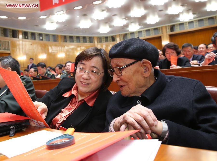 Delegates watch the ballot during the closing session of the 18th National Congress of the Communist Party of China (CPC) at the Great Hall of the People in Beijing, capital of China, Nov. 14, 2012. (Xinhua/Liu Weibing) 