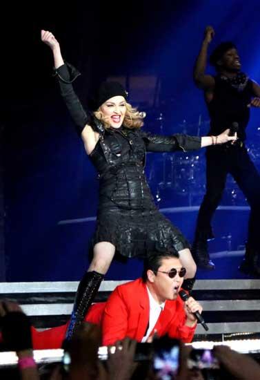 Psy joined the Madonna and her troupe of dancers onstage to perform his hit song “Gangnam Style”.