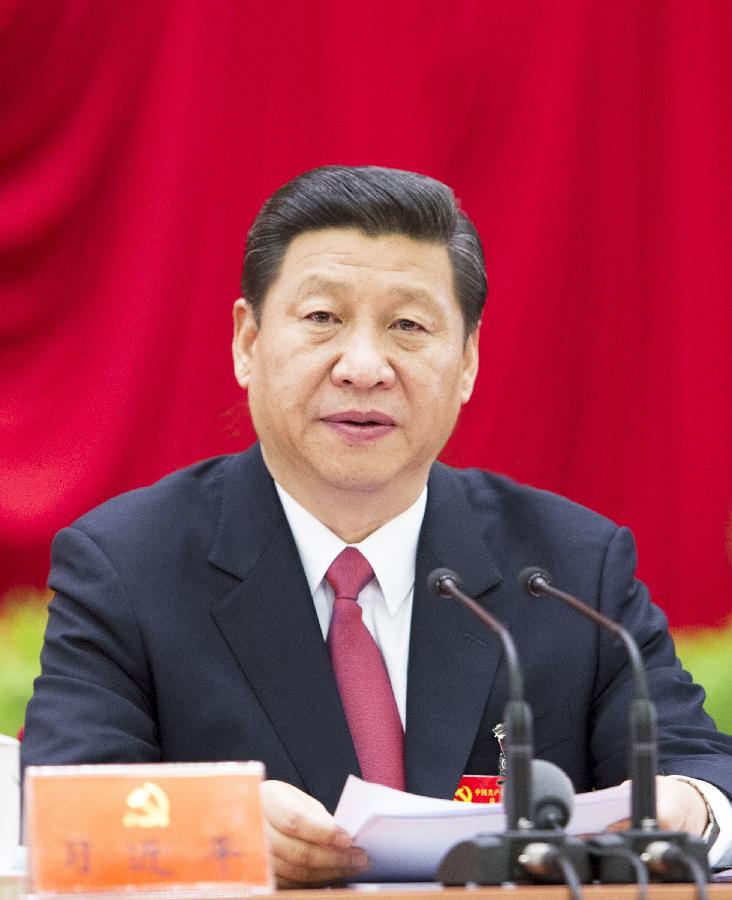 11月15日，中国共产党第十八届中央委员会第一次全体会议在北京人民大会堂举行。习近平同志主持会议并作重要讲话。[新华社 李学仁 摄]