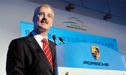 Helmut Broeker, chief executive officer of Porsche China, at the awards ceremony and exhibition opening for the Porsche's 'Empowering the Future' Art Contest at the Chongqing Art Museum last month. [Shanghai Daily]