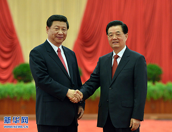 Chinese President Hu Jintao (R) shakes hands with newly-elected General Secretary of the Communist Party of China (CPC) Central Committee and Chairman of the CPC Central Military Commission Xi Jinping as they meet with delegates, special delegates and observers to the recently concluded 18th CPC National Congress, in Beijing, capital of China, Nov. 15, 2012. [Xinhua Photo]