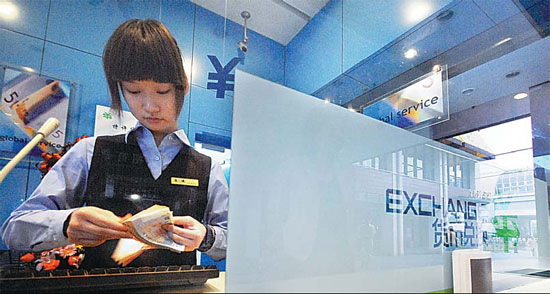 A currency exchange in Shanghai. From Dec 17, foreign investors will no longer need regulatory permission to open bank accounts, to remit profits abroad and transfer money between different domestic accounts.[China Daily]