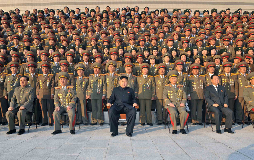 This photo provided by KCNA on Nov. 21, 2012 shows Kim Jong Un (C,Front), top leader of the Democratic People&apos;s Republic of Korea (DPRK), visits the Ministry of State Security, on Nov. 20, 2012. 