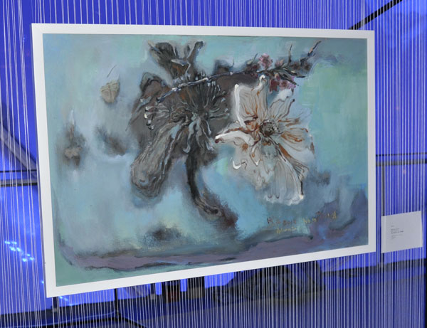 A painting is on display at a charity auction held at the National Aquatics Center in Beijing on Thursday.