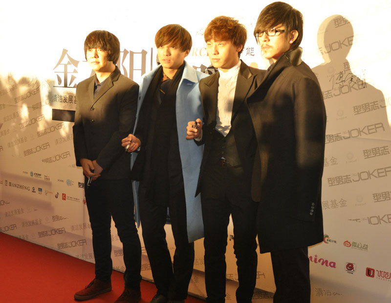 The Super VC boy band poses for photos at a charity auction held at the National Aquatics Center, also known as the Water Cube, on Nov. 22.