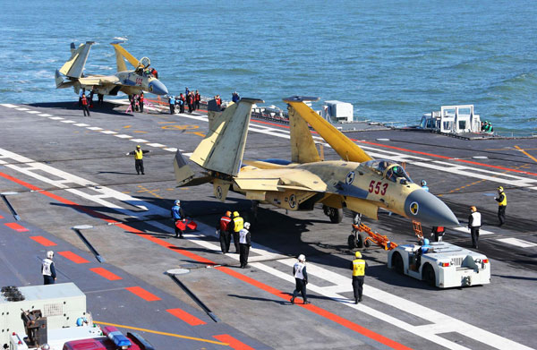 A J-15 fighter jet on China's first aircraft carrier, the Liaoning. [Photo/Xinhua]