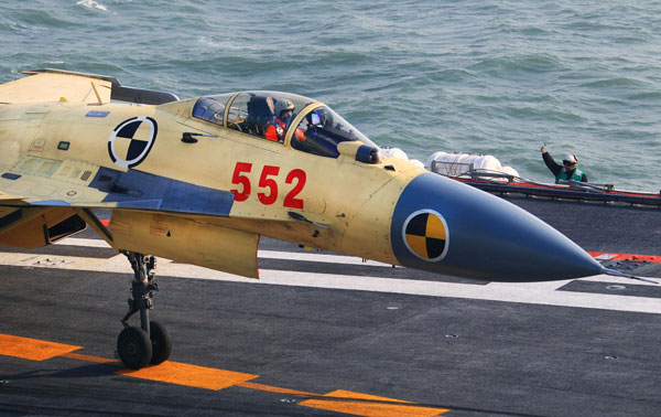A J-15 fighter jet prepares to take off from China's first aircraft carrier, the Liaoning. [Photo/Xinhua]