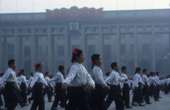 School students parade at Tiananmen Square.