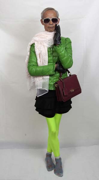 72-year-old Liu Qianping, also known as 'MaDiGaGa', poses for a modelling shoot in the southern Chinese city of Guangzhou Nov 24, 2012.[China Daily via Agencies]
