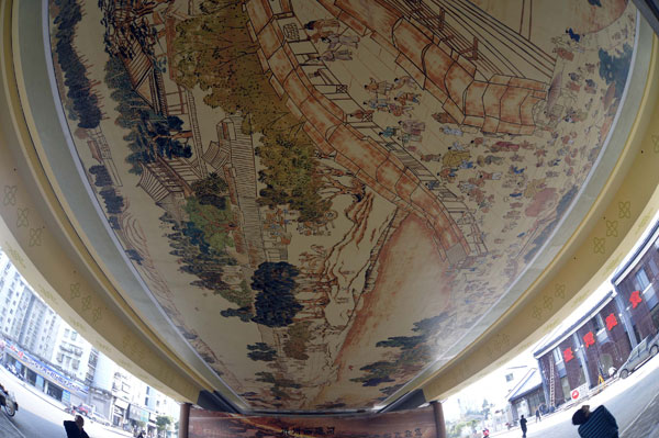 A 30-by-10-meter replica of Along the River During the Qingming Festival - a famous ancient Chinese panoramic painting – is drawn under an overpass in the eastern city of Hangzhou, Zhejiang province, on Nov 26, 2012. [Photo/asianewsphoto]