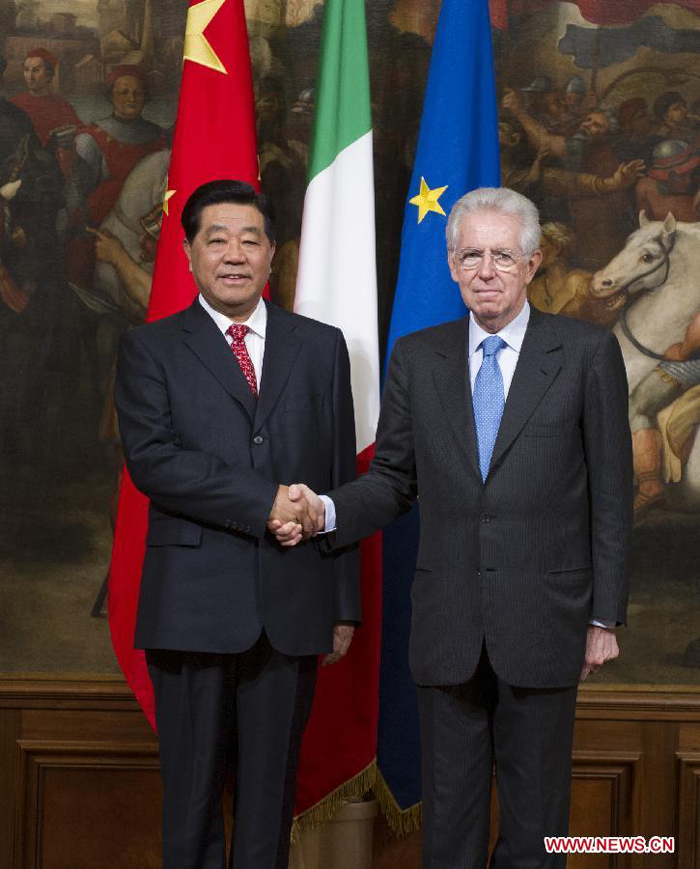 Jia Qinglin (L), chairman of the National Committee of the Chinese People&apos;s Political Consultative Conference, meets with Italian Prime Minister Mario Monti in Rome, capital of Italy, Nov. 28, 2012.