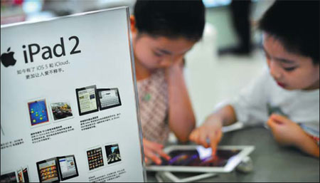The current generation of children is exposed early to digital devices such as the iPad and other tablets and mobile computers. [Photo/Provided to China Daily]
