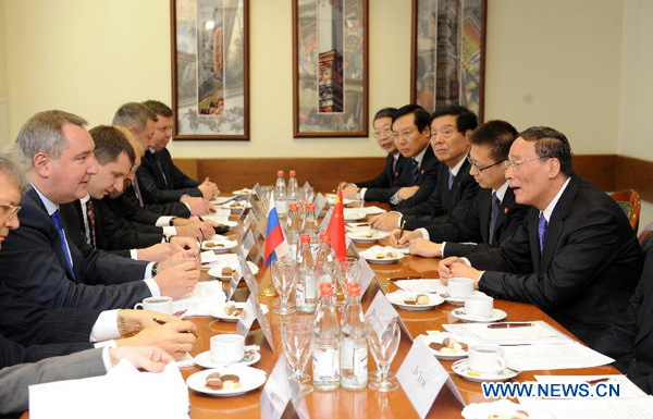 Chinese Vice Premier Wang Qishan (1st R) attends the 16th meeting of the Joint Commission for the Regular Meetings of Heads of Government of China and Russia, in Moscow on Dec. 5, 2012.