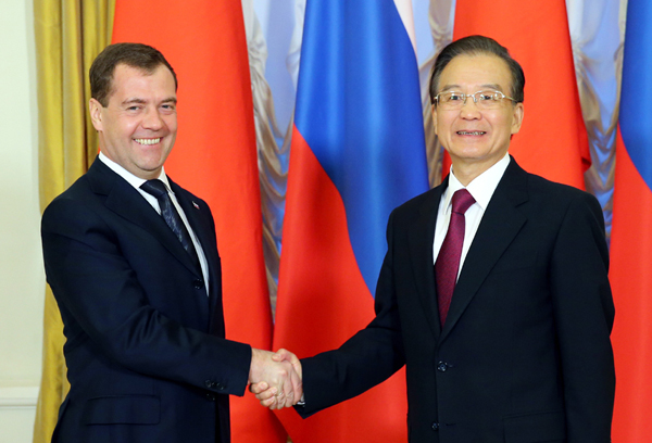 Chinese Premier Wen Jiabao and Russia's Prime Minister Dmitry Medvedev meet in Moscow on Thursday. [Photo: Xinhua]