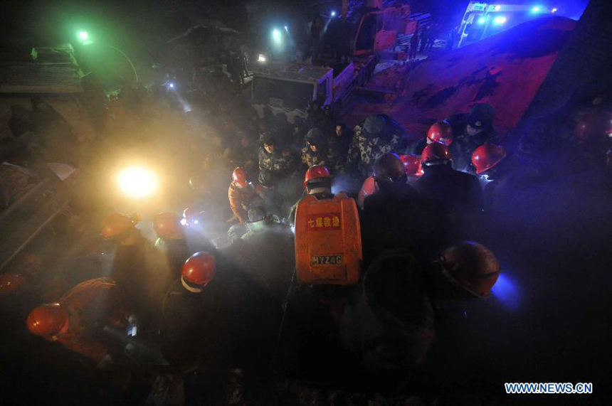 Rescuers conduct a rescue operation at the flooded Furuixiang Coal Mine in Qitaihe, northeast China&apos;s Heilongjiang Province, Dec. 7, 2012. 