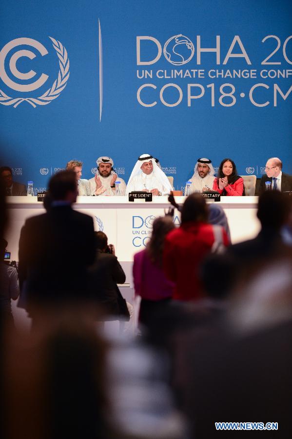 Doha climate talks reach weak commitment