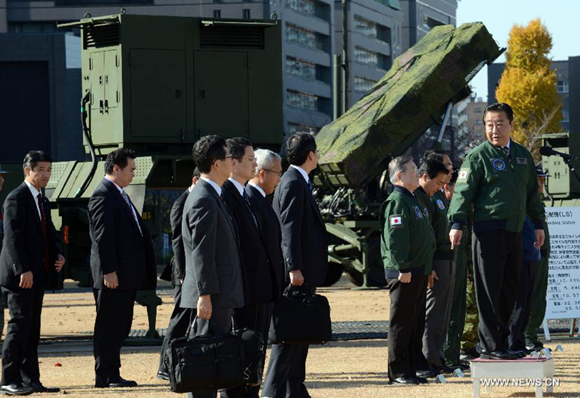 Japanese Prime Minister Yoshihiko Noda (1st R) inspects the PAC-3 (Patriot Advanced Capability-3) missile unit in Tokyo, Japan, Dec. 7, 2012. Japanese government has deployed PAC-3 missiles in Tokyo and Okinawa after the Democratic People's Republic of Korea (DPRK) announced their satellite launch plan.