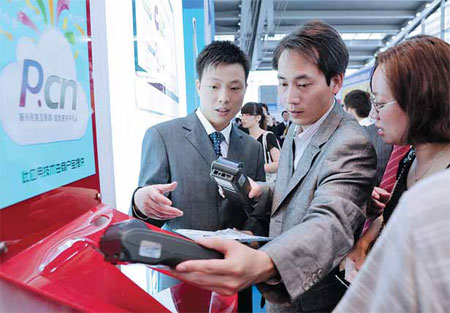 Mobile payment technology displayed at an international telecommunications exhibition in Shenzhen, Guangdong province. Innovation Works is focusing on the IT, software and mobile segments. Its founder Kai-Fu Lee said most mistakes are made in first 12 to 18 months in business. [China Daily]
