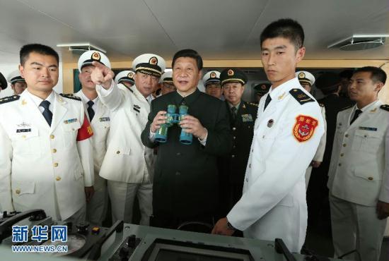 During his tour, Xi spent three days inspecting a military base in Guangzhou. There he called on the PLA to 'revolutionize, modernize and standardize' its forces. 