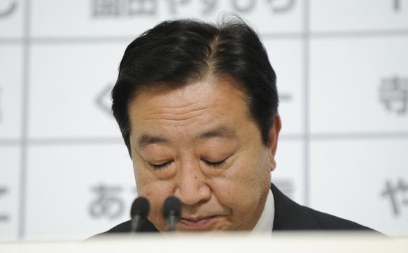 Japan's Prime Minister Yoshihiko Noda, leader of Japan's Democratical Party of Japan (DPJ), pauses during a news conference at his party's election headquarters in Tokyo, Dec. 16, 2012. Yoshihiko Noda, said on late Sunday that he quits from the party's presidency. [Xinhua]