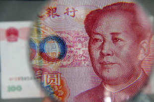 Central bank chief Zhou Xiaochuan said on Monday that the country's goal to achieve the yuan's capital account convertibility doesn't necessarily mean 100 percent convertibility or a free-floating currency.