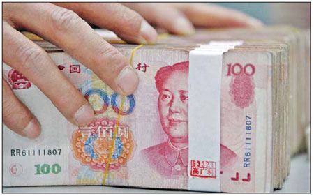 The amount of new yuan loans extended by Chinese banks next year is likely to equal or even surpass the record high set in 2009. [File Photo]