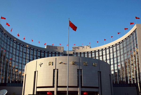 The headquarters of the People's Bank of China in Beijing. Top officials of the central bank and the Ministry of Finance may soon resume holding regular meetings to better coordinate economic policy. [Guo Tai / For China Daily] 