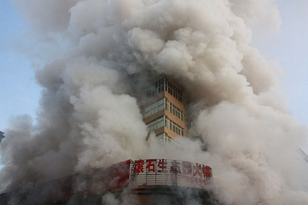 2 dead, 20 injured in NW China building fire