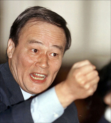 File photo taken in March 1999 shows Wang Qishan speaks within the delegation of south China's Guangdong Province while attending the 2nd Session of the 9th National People's Congress (NPC). [Photo/Xinhua]