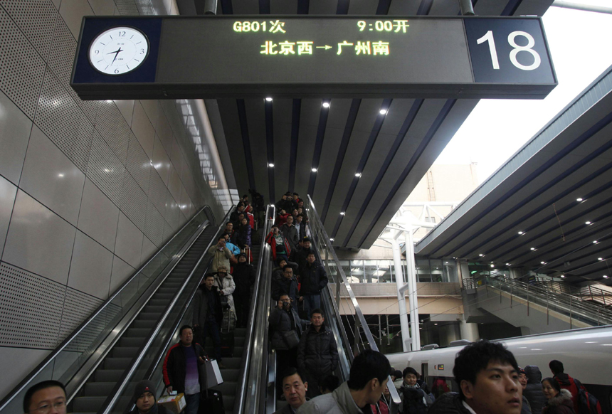 Beijing-Guangzhou high-speed railway opens on Dec. 26 and is expected to cut the travel time to about 8 hours from the current 20-odd hours by traditional lines. [Xinhua photo]