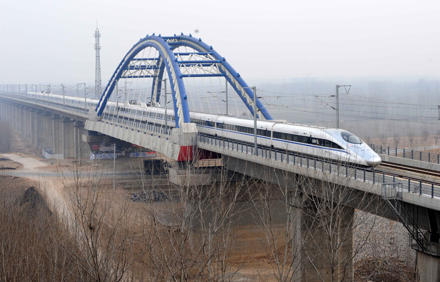 Beijing-Guangzhou high-speed railway opens on Dec. 26 and is expected to cut the travel time to about 8 hours from the current 20-odd hours by traditional lines. [Xinhua photo]