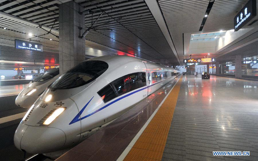 High-speed train G502 leaves the Changsha South Railway Station in Changsha, capital of central China's Hunan Province, Dec. 26, 2012. 